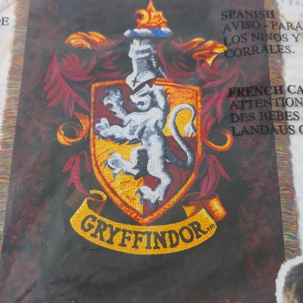 Brand new Harry Potter Gryffindor tapestry throw NIP 60" X 48"
